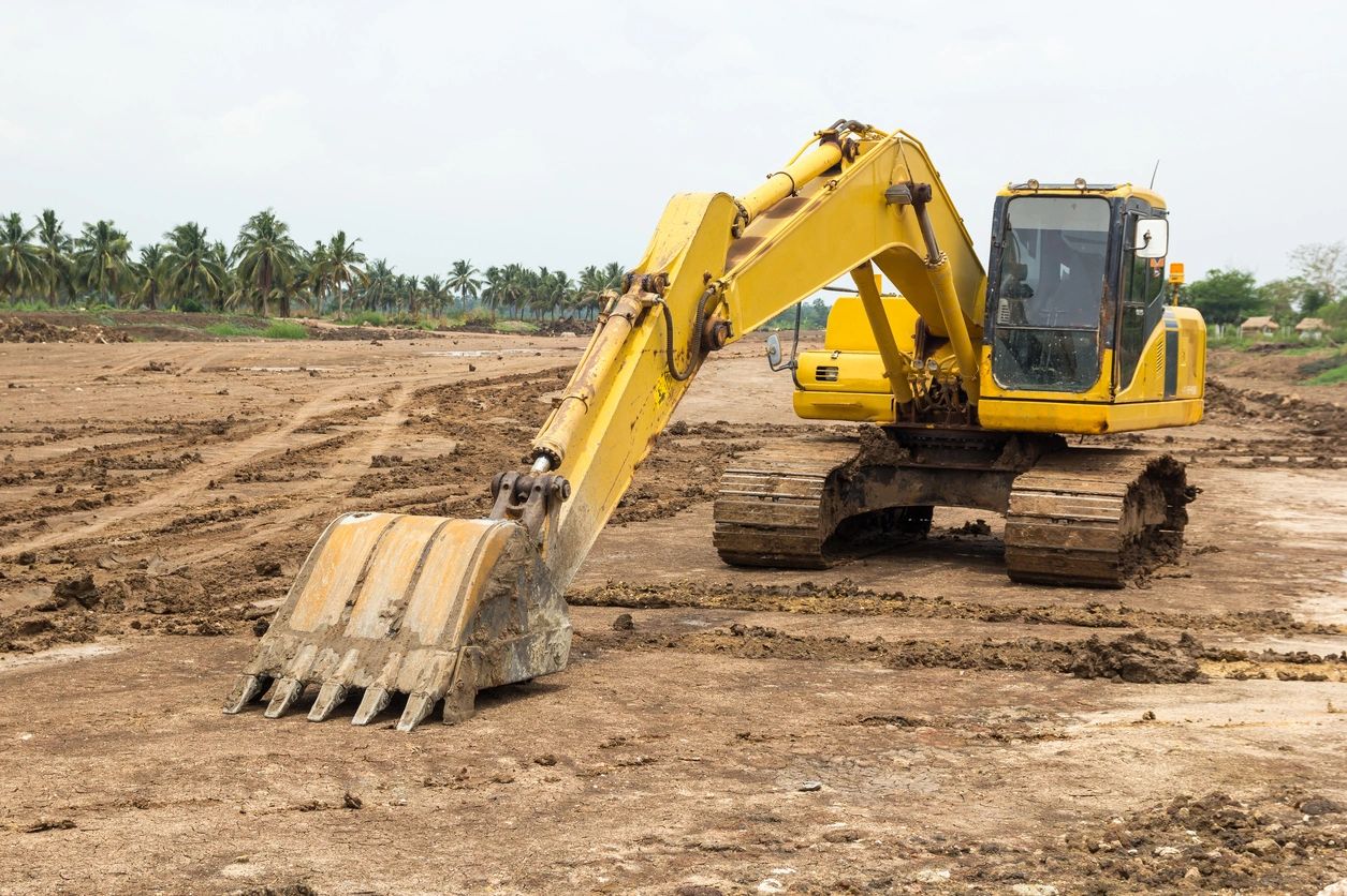 Excavator preparing a residential building site in West Salem, Wisconsin